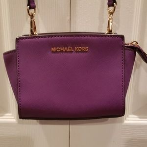 Michael Kors cross body mini bag.